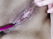 Horny mature LoveCatsuit fingering her cunt