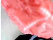 Играется с игрушкой.