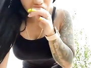 BellaLike на скамейке в парке